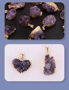 Detailed view of natural raw amethyst crystal pendants with elegant gold plated edges