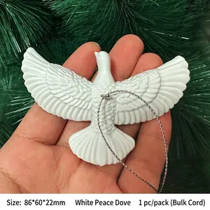 Detailed view of a white ceramic peace dove hanging ornament with feather textures