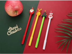 Detailed view of Christmas cartoon gel pens with Santa, reindeer, and snowman toppers