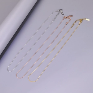 Three 18K gold-plated snake chain necklaces in silver, rose gold and gold finishes