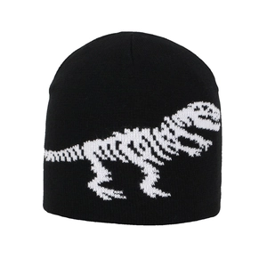 Close-up detail of knitted black beanie featuring a white dinosaur skeleton jacquard design