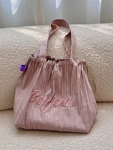 Pink striped canvas tote bag with Bonjour embroidery and drawstring closure
