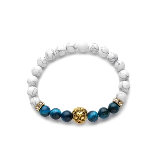 White marble and blue tiger eye beaded bracelet with a golden lion head charm
