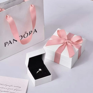 Polished silver ring in elegant gift set with white box and pink ribbon shopping bag