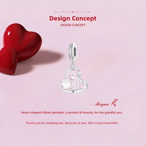Detail of pink heart-shaped stone pendant in a 925 sterling silver ribbon setting