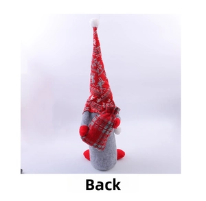 Vue arrière d'un lutin de Noël avec bonnet rouge à flocons et petit sac à carreaux