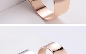 Polished silver and rose gold bangles showing smooth edges and clasp details