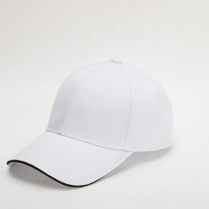Detail view of white baseball cap with black contrast brim in minimalist style