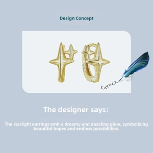 Detail view of s925 sterling silver star hoop earrings in a golden finish with geometric rays