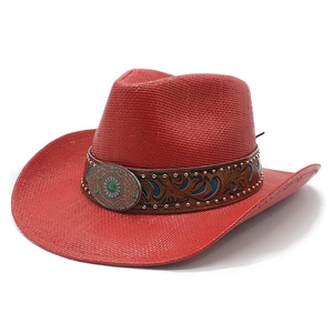 Red woven cowboy hat with turquoise western buckle and studded leather band for sun protection