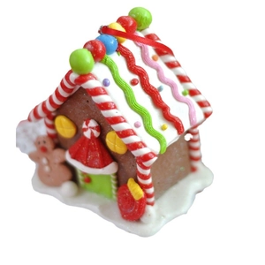 Colorful polymer clay gingerbread house Christmas ornament with red ribbon hanger