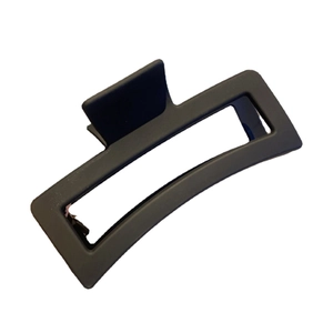 Minimalist matte black large resin hair claw clip in a square hollow design on white base