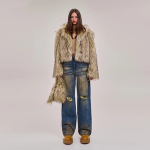 Faux fur jacket and distressed wide-leg jeans with ripped details and platform shoes