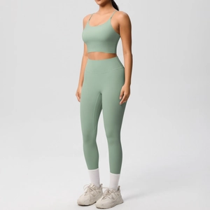 Detailed front side view of sage green high-waisted yoga leggings and sports bra set