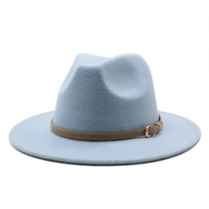 Close-up of light blue wide brim fedora with a brown leather band and gold metal buckle
