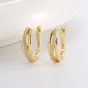 Irregular S925 sterling silver hoop earrings with 14K gold plating and pavé zircons