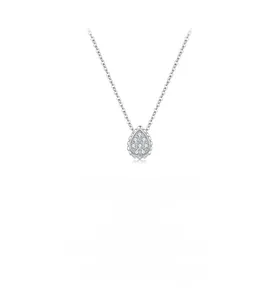Macro shot of silver teardrop pendant with micro-bead edges and pavé set cubic zirconia