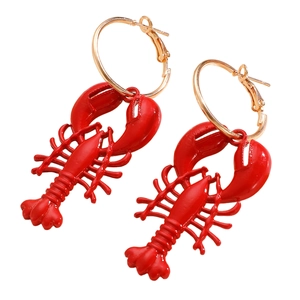 Fashionable red lobster drop earrings with gold hoops and vibrant sea life charms