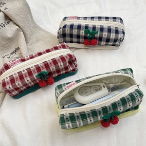 Three-piece set of plaid fabric pouches with cute cherry zipper charms for stationery