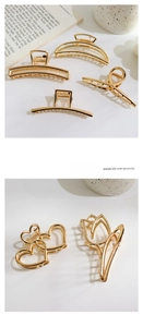 Detail of golden metal hair claws in heart, tulip, and geometric shapes with high polish