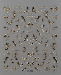 Macro shot of 3D dragon nail stickers with gold and black metallic embossed textures