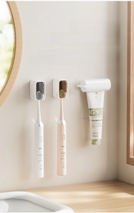 Wall-mounted electric toothbrush holder with dust-proof cover and toothpaste dispenser