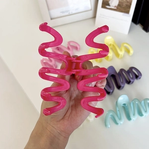 Large wave hair claw clips in colorful matte finish for thick hair styling