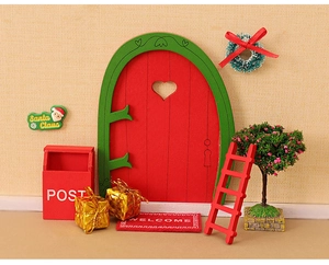 Detailed miniature Christmas dollhouse set with red wooden door and tiny holiday accessories