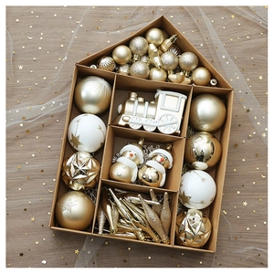 Detailed set of gold and white Christmas ornaments including snowmen and festive baubles