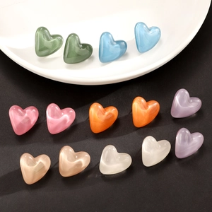 Colorful heart-shaped cat eye resin stud earrings set in various pastel shades