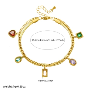 Detail view of gold stainless steel double chain bracelet with colorful gemstone charms