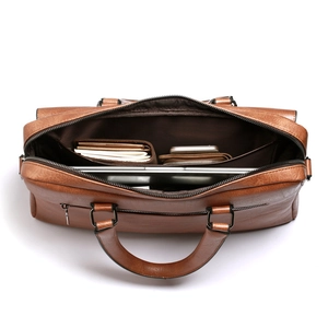 Brown leather business briefcase with internal compartments for laptop and documents