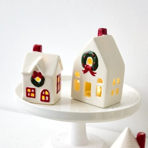Nordic ceramic Christmas house set with glowing windows and red chimney tabletop decor
