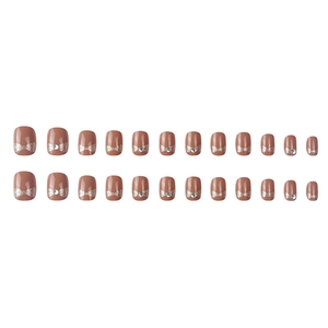 Short nude press-on nails set with glitter bows and sparkling rhinestones 24pcs