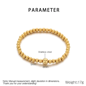 Macro detail of 18K gold plated stainless steel beads with 5mm and 8mm diameter specs