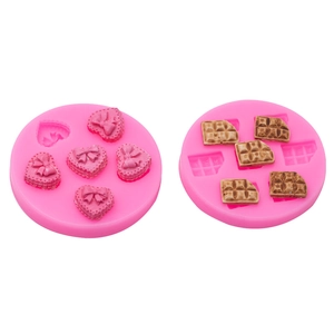 Silicone molds for DIY ice cream and heart chocolate crafts with bow tie designs