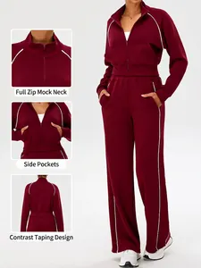 Women's burgundy two-piece sports set with contrast tape and stand collar jacket