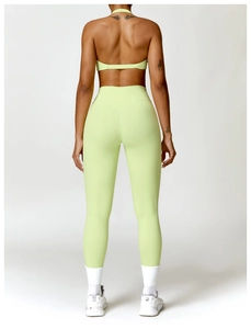 Rear view of tight high-waist yoga leggings showing slimming fit and elastic fabric