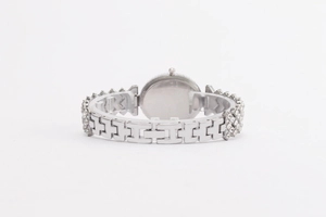 Detailed back view of a silver-tone rhinestone watch with an H-shaped link bracelet