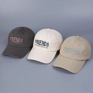 Detailed close-up of colorful cotton baseball caps with high-quality 3D embroidery