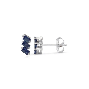 Detail view of S925 silver stud earrings with three asymmetric blue zircon stones