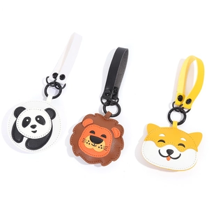 Cute leather animal keychains featuring panda, lion, and shiba inu with metal rings