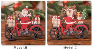 Detail of wooden Christmas ornaments featuring snowman and reindeer on bicycles