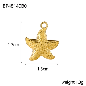 Detailed view of gold starfish pendant with dotted texture, 1.7cm size and top loop