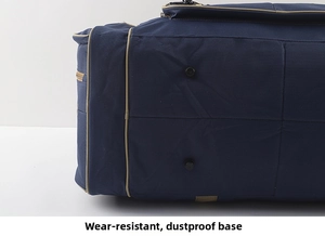 Detail of travel bag bottom featuring durable black dustproof feet and khaki trim