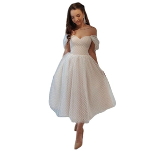 Elegant off-shoulder sweetheart wedding dress in ivory lace dot mesh with a puffy skirt