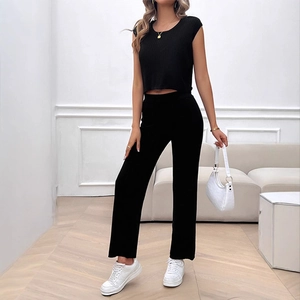 Women's 2-piece black ribbed set with sleeveless crop top and wide leg pants