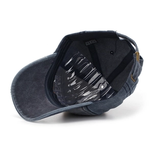 Internal view of cotton baseball cap showing lining, stitching, and metal buckle