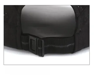 Close-up of the adjustable strap and breathable mesh on the back of the black cap