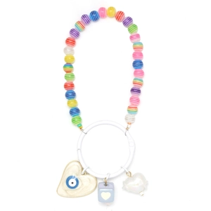 Detail of rainbow bead keychain featuring golden heart evil eye and cube pendants